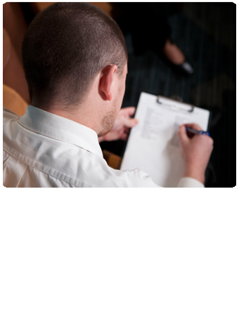 Image of client filling out form. Image of client filling out form.