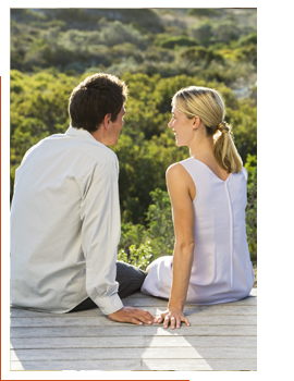 Couple sitting outside talking